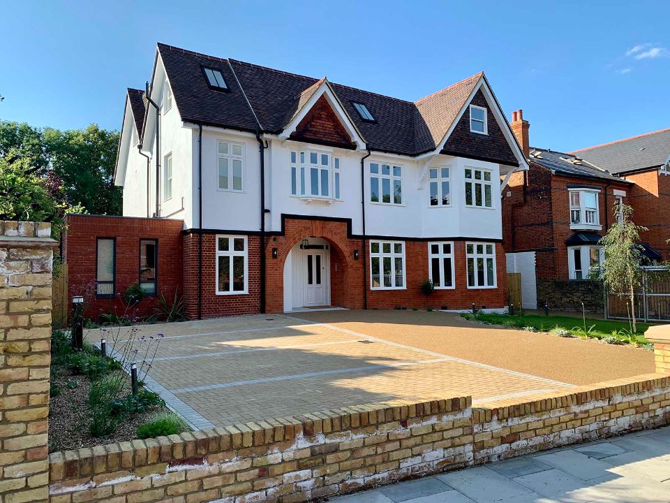 house with multiple white framed windows